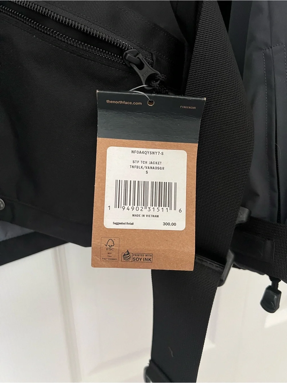 The North Face Steep Tech Men’s Black, Gray & Orange Ski Jacket